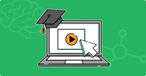 A laptop with a graduation hat displays a video player pointed to by a mouse cursor.